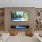 Clubroom with seating, tv, fireplace, and bookshelves with decor