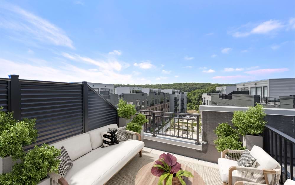 Private outdoor balcony attached to a Wilton CT spacious apartment offering peaceful outdoor seating space