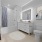 Bathroom with large tub, vanity with LED backlight mirror and built in storage